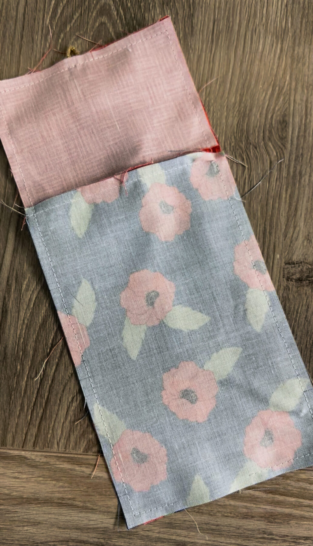 Image contains the front and back of the firecracker sewn together, inside out.