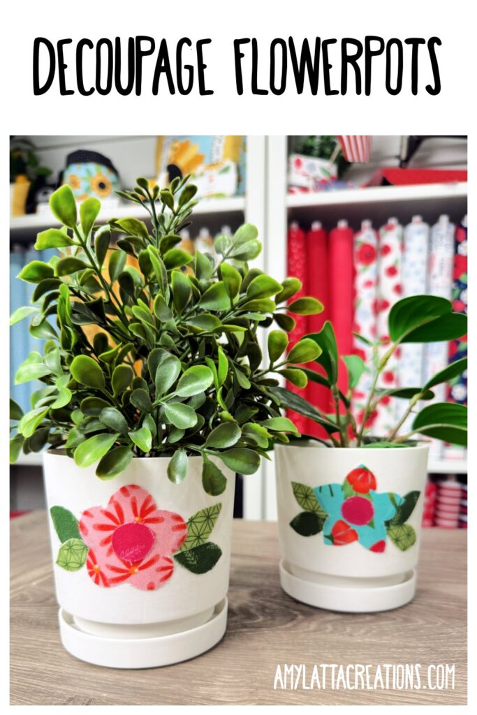Image contains two faux plants in white plastic flowerpots decorated with fabric flowers.